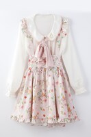 「トップス＆ジャンパースカートセット」のピンクベージュ。