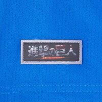 「進撃のTECH FIT」タイトルロゴのワッペン。