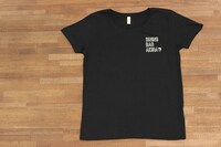 「くいもの処 明楽」のTシャツ。