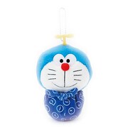 ドラえもんのマスコットホルダー。ひっくり返すと「タイムふろしき」が登場する。