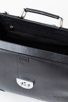 間黒男をイメージしたショルダーバッグ。