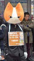 手をポケットに突っ込んだ猫田。