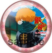 「あんぱんガラポン」でもらえる缶バッジ。