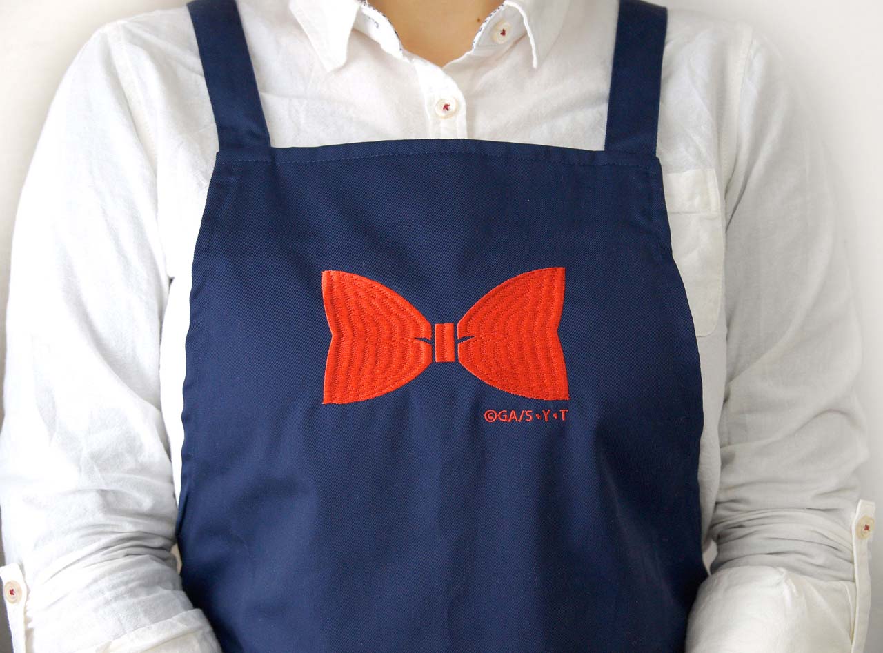 「コナンストアエプロン」