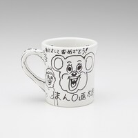 プレゼントキャンペーンで当たる、直筆イラスト入り「まん○画太郎×TENGA ドクミ マグカップ」。