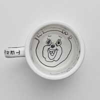 プレゼントキャンペーンで当たる、直筆イラスト入り「まん○画太郎×TENGA ドクミ マグカップ」。