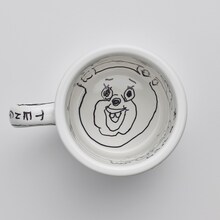 プレゼントキャンペーンで当たる、直筆イラスト入り「まん○画太郎×TENGA ドクミ マグカップ」。