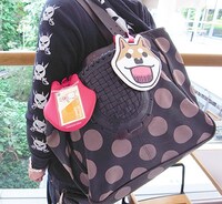 「いとしのムーコ」パスケースの使用例。