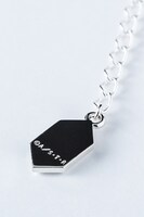 「家庭教師ヒットマンREBORN！」コラボネックレスの裏面。