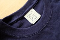 「無能の人」に登場する“石“マーク入りのタグ。