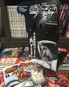 書店に設定された、「機動戦士クロスボーン・ガンダム DUST」の販売台。