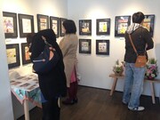 2014年に根津ギャラリーで開催された「オチビサン」原画展の様子。