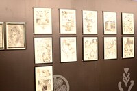 会場に展示された「無限の住人」の原画。