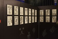 会場に展示された「無限の住人」の原画。