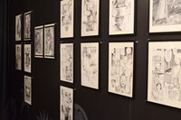 会場に展示された「無限の住人」の原画。