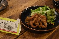 「キンツル（豚の男性器）炒め」