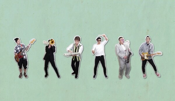 「レッツゴー！ムッツゴー！～6色の虹～」のミュージックビデオのワンシーン。