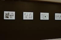 「煉獄に笑う ～舞台×原作～展」の様子。