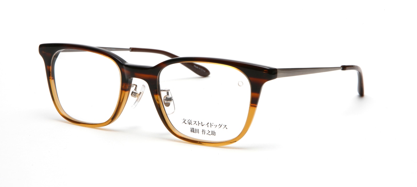 織田作之助モデルのフロントは、ツートーンカラーで織田が好むフリイダムの混ぜカレーを表現。ツルは織田の二丁拳銃をイメージさせるガンメタリックカラーで、耳かけ部分はステンドグラス模様に似たシックな生地を使用する。