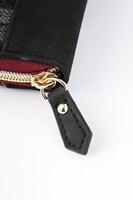 アーチャーモデルの長財布。