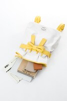 巴マミモデルのバッグ。