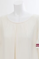 テーマ「Pink Blooming」のブラウス。