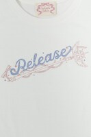 テーマ「Clear Blooming」のTシャツ。