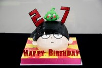 茂夫の顔を模した誕生日ケーキ。