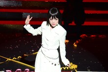 田上真里奈扮する六口。