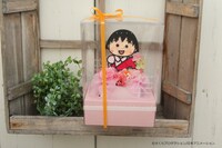 「フラワードール（まる子）」のラッピングイメージ。