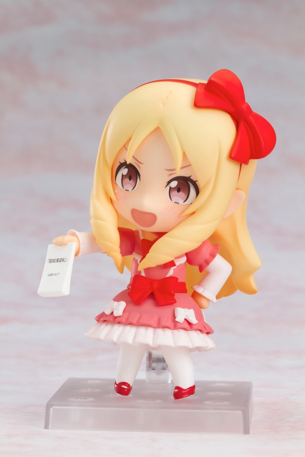 ドヤ顔で原稿を見せる「ねんどろいど 山田エルフ」。