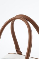 「夏目友人帳」コラボレーションバッグの持ち手部分。