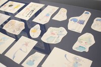 「夜明け告げるルーのうた」の展示コーナー。