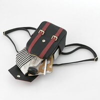 黒のライダーモデルのバッグ。