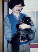 谷口ジローと愛猫のクロ。