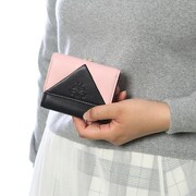 九条天をモチーフにしたミニ財布の使用例。