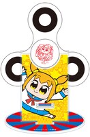 「ポプテピピックハンドスピナー」はカラフルな台座付き。画像は組み立て後の完成イメージ。