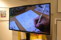 モニターで上映されている作画動画。