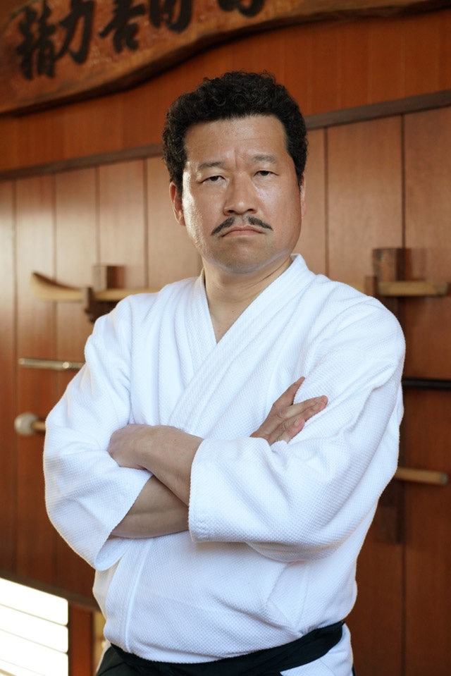 佐藤二朗扮する赤坂哲夫。