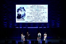 「学園BASARA」ステージの模様。テーマソングを担当する西川貴教からのメッセージ。(c)CAPCOM/私立BASARA学園