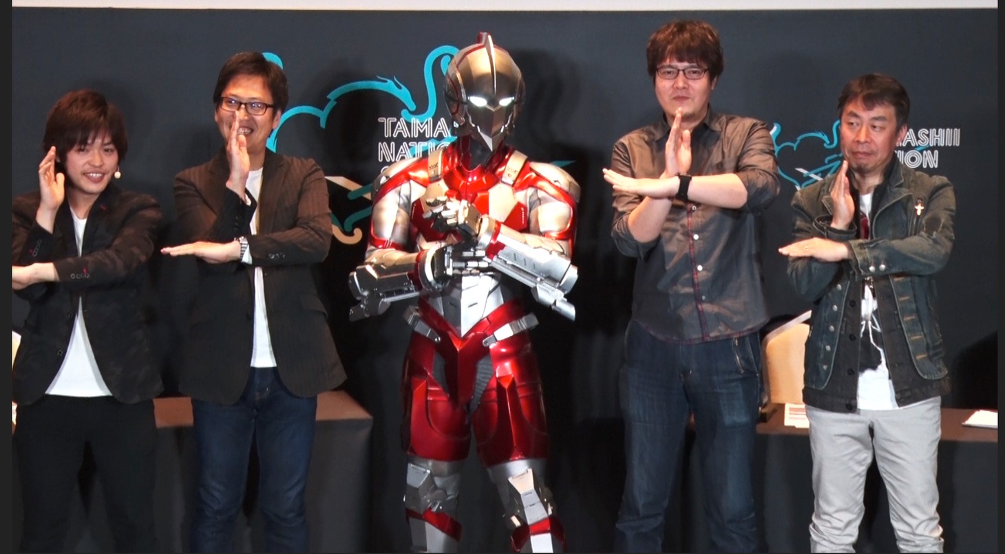 アニメ「ULTRAMAN」のステージイベントの様子。左から、光岡祐希、橋本トミサブロウ、清水栄一、澗淵隆文。