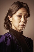 田中良子扮するルシール・ベルヌイユ。