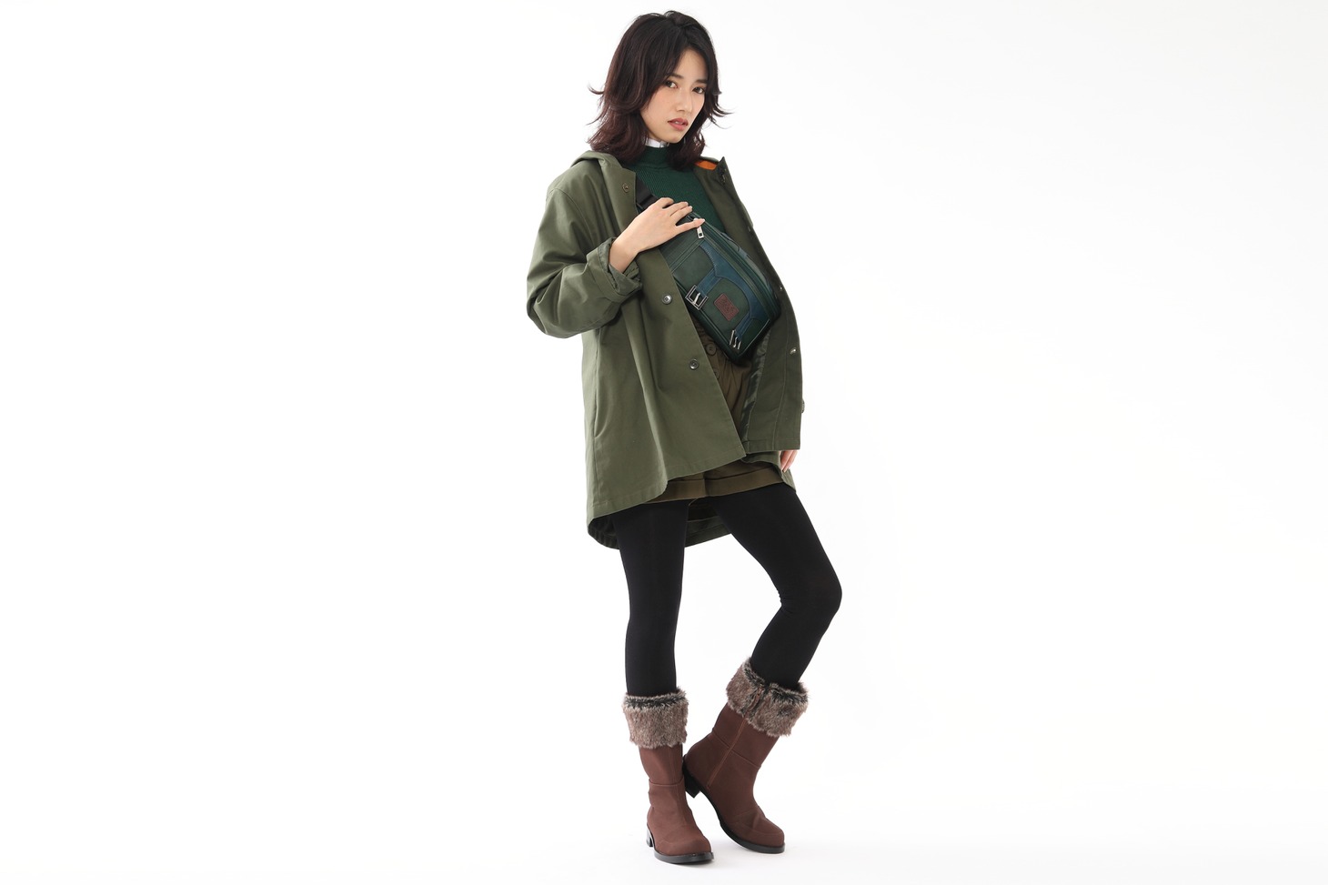 アーチャーモデルのアウター着用例。