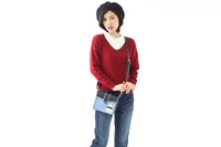 Legendersモデルのリュックに付属するフロントポーチの使用イメージ。