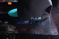 「ゲームセンターあらし」のインベーダーキャップ。