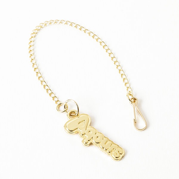 「想いよひとつになれ」をモチーフにした、国木田花丸モデルのスマートフォンケースのストラップ。