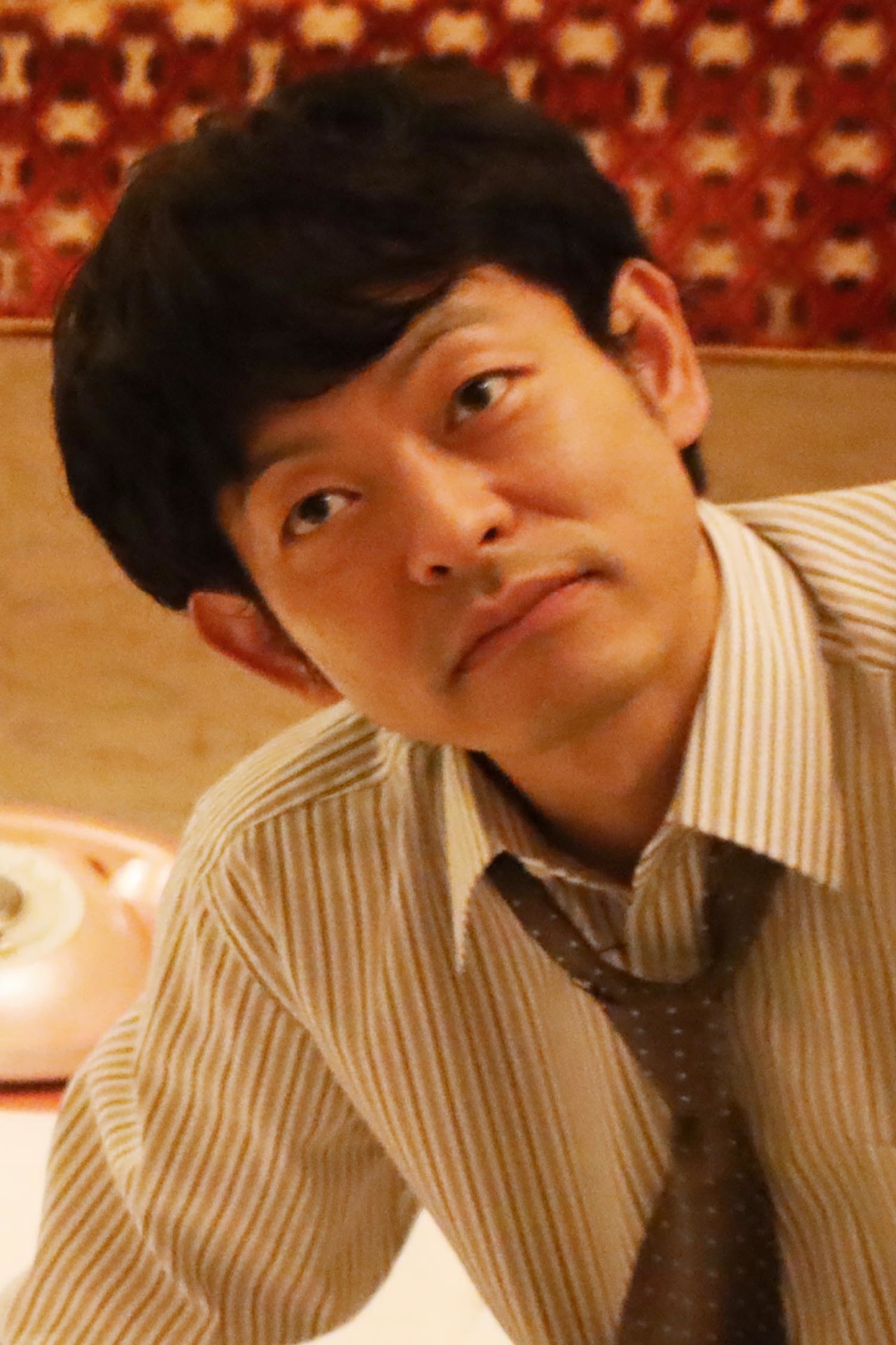 嫌われ者の迷惑客・安田役の山中崇。