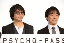 左から東地宏樹、関智一。