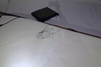 寺田の手元には、この日のトーク中に描いた祖父江の似顔絵が残されていた。