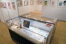 弓月光の愛用物などが並ぶコーナー。